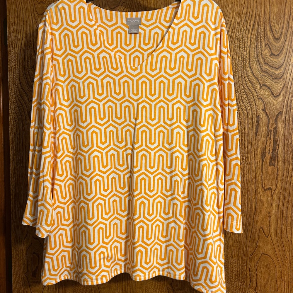 Chico's Vibrant Orange and White Geometric Tunic
